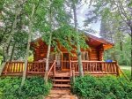 Sleeping Wolf Cabin and front porch in summer